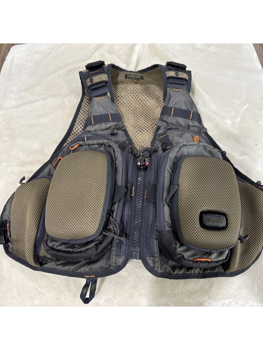 FISHPOND fly fishing VEST. Lightly used. Hard front pockets. 14+ POCKETS RUGGED